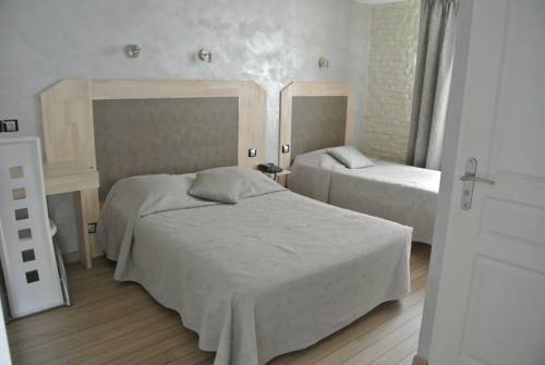 Imagen de la habitación del Hotel La Glycine. Foto 9