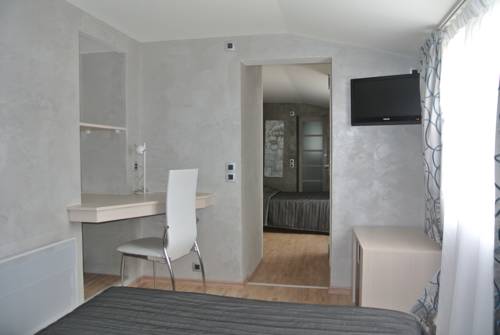 Imagen de la habitación del Hotel La Glycine. Foto 10