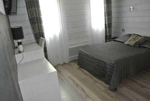 Imagen de la habitación del Hotel La Glycine. Foto 15