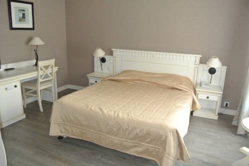 Imagen de la habitación del Hotel La Glycine. Foto 16