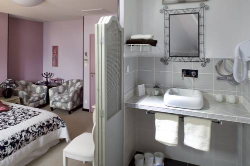 Imagen de la habitación del Hotel La Gourmandine. Foto 5