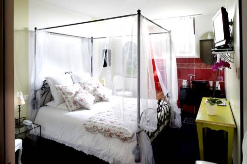 Imagen de la habitación del Hotel La Gourmandine. Foto 11