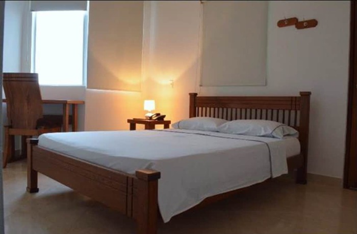 Imagen de la habitación del Hotel La Gran Esquina. Foto 12