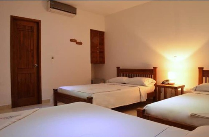 Imagen de la habitación del Hotel La Gran Esquina. Foto 14