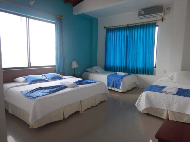 Imagen de la habitación del Hotel La Gran Tortuga. Foto 12