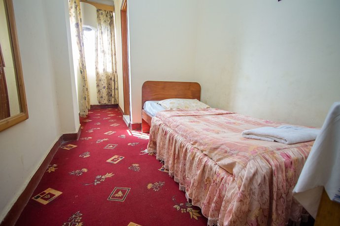 Imagen de la habitación del Hotel La Grand Chez Johnson Muyenga. Foto 6