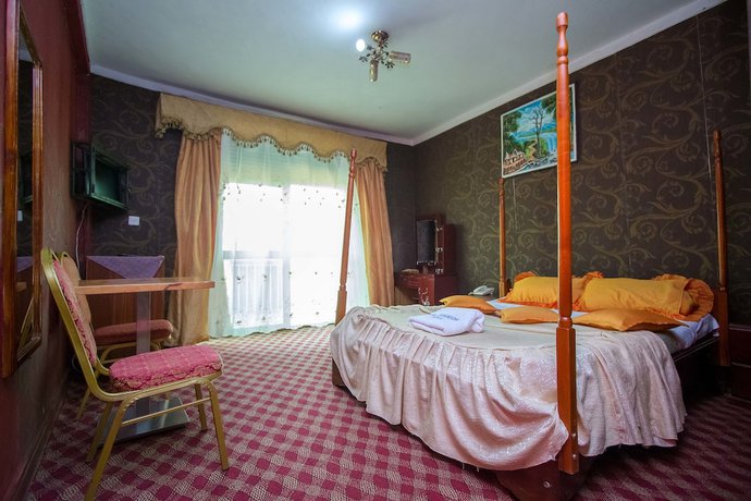 Imagen de la habitación del Hotel La Grand Chez Johnson Muyenga. Foto 7