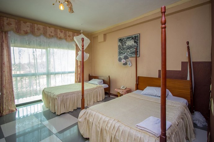 Imagen de la habitación del Hotel La Grand Chez Johnson Muyenga. Foto 12