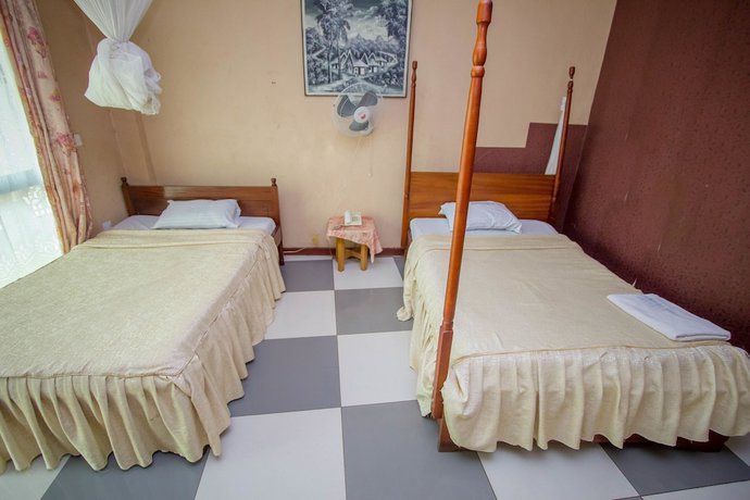 Imagen de la habitación del Hotel La Grand Chez Johnson Muyenga. Foto 14