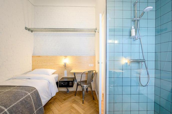 Imagen de la habitación del Hotel La Grande Cloche. Foto 3