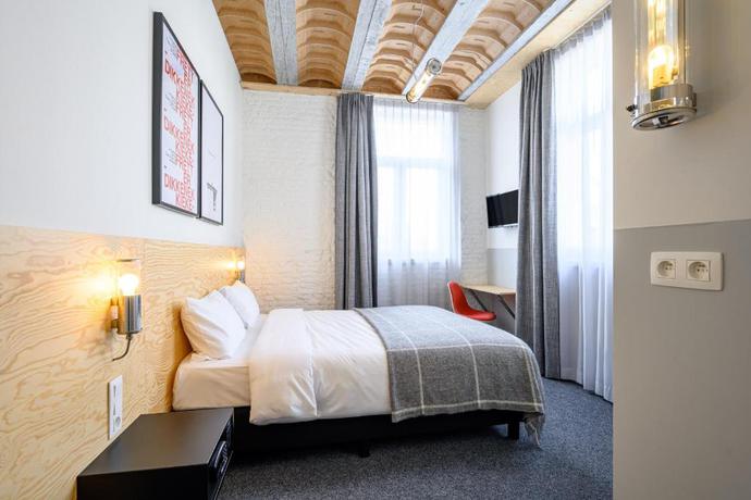 Imagen de la habitación del Hotel La Grande Cloche. Foto 5