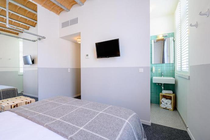 Imagen de la habitación del Hotel La Grande Cloche. Foto 9