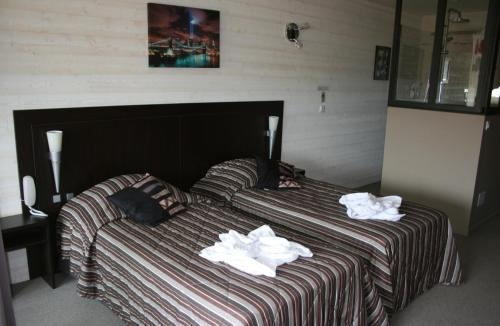 Imagen de la habitación del Hotel La Grande Conque. Foto 9