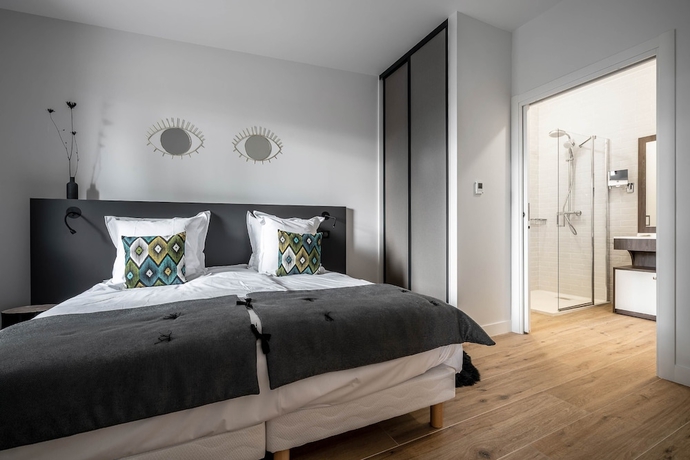 Imagen de la habitación del Hotel La Grange des Pères. Foto 10