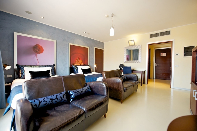 Imagen de la habitación del Hotel La Griffe. Foto 4