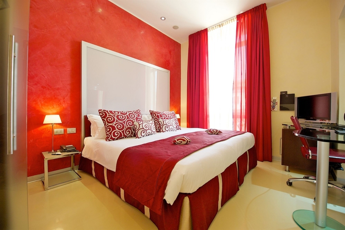 Imagen de la habitación del Hotel La Griffe. Foto 12