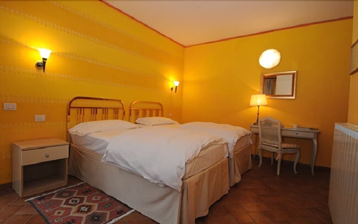 Imagen de la habitación del Hotel La Griglia. Foto 12