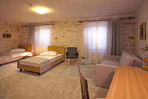 Imagen de la habitación del Hotel La Grisa. Foto 8