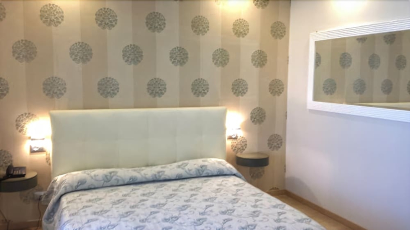 Imagen de la habitación del Hotel La Grotta, Verona. Foto 9