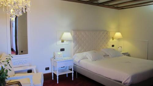 Imagen de la habitación del Hotel La Hacienda Del Buen Suceso. Foto 23