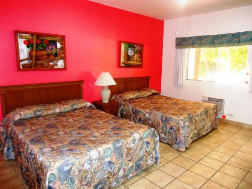 Imagen de la habitación del Hotel La Hacienda de la Langosta Roja. Foto 19