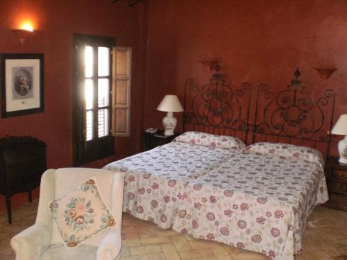 Imagen de la habitación del Hotel La Hospederia Del Monasterio. Foto 8