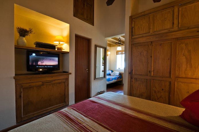 Imagen de la habitación del Hotel La Hoster&iacute;a Caril&oacute; Spa. Foto 7