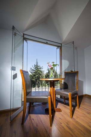 Imagen de la habitación del Hotel La Hostería. Foto 15