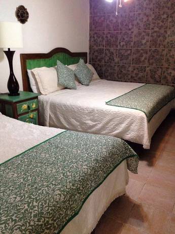 Imagen de la habitación del Hotel La Huerta, San Miguel de Allende. Foto 6