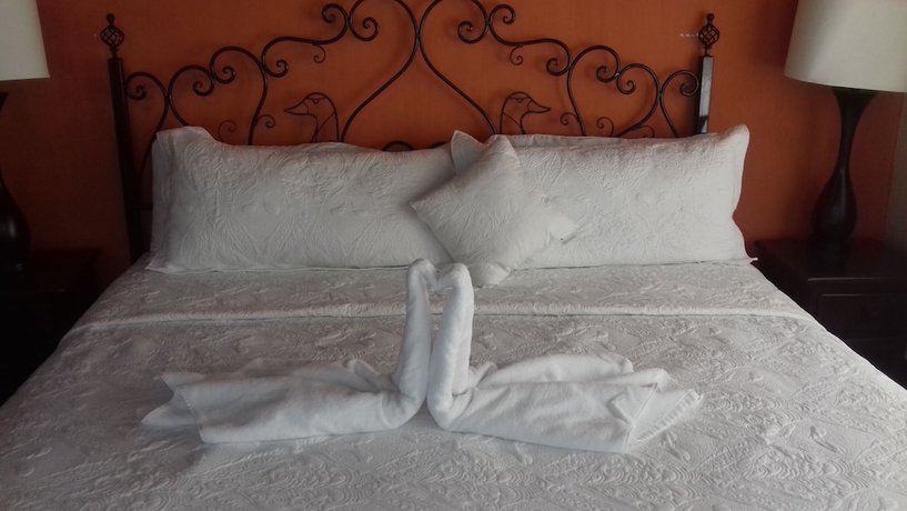 Imagen de la habitación del Hotel La Huerta, San Miguel de Allende. Foto 13