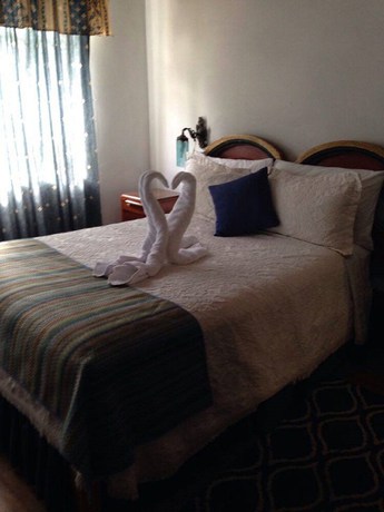 Imagen de la habitación del Hotel La Huerta, San Miguel de Allende. Foto 15