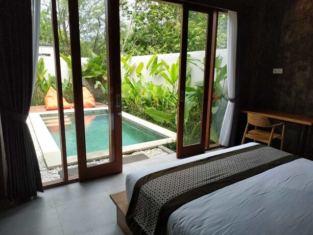 Imagen de la habitación del Hotel La Isla Villas Bali. Foto 31