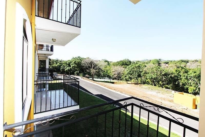 Imagen de la habitación del Hotel La Jacaranda Luxury Condos. Foto 4