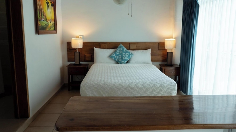 Imagen de la habitación del Hotel La Joya del Lago. Foto 4