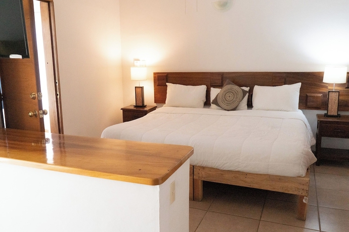 Imagen de la habitación del Hotel La Joya del Lago. Foto 8