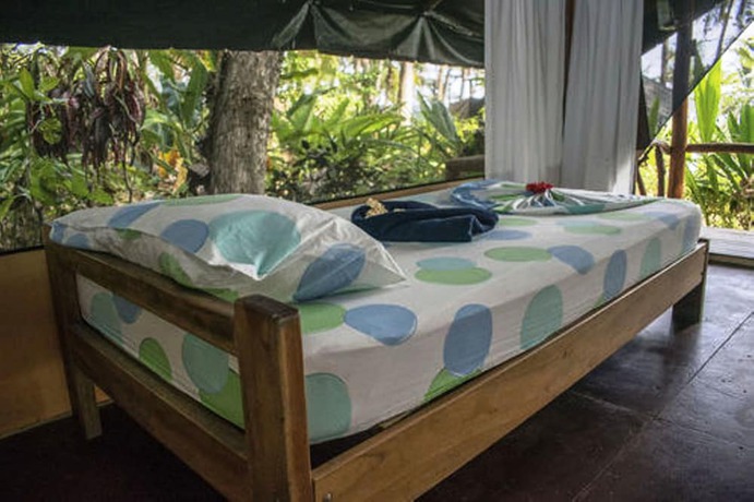 Imagen de la habitación del Hotel La Leona Eco Lodge. Foto 14