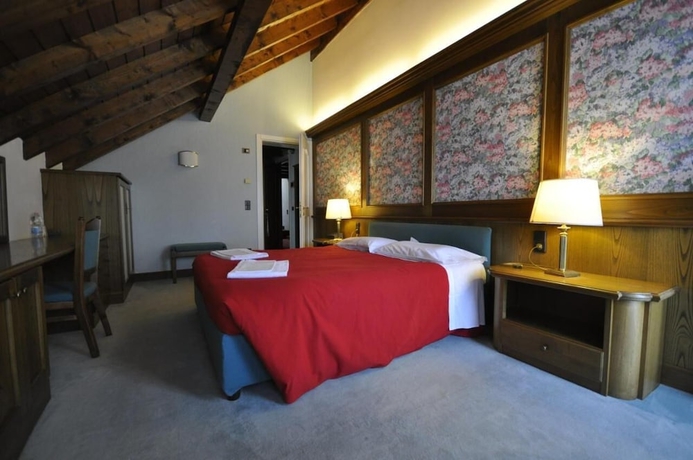 Imagen de la habitación del Hotel La Lepre Bianca. Foto 5