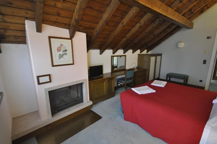 Imagen de la habitación del Hotel La Lepre Bianca. Foto 8