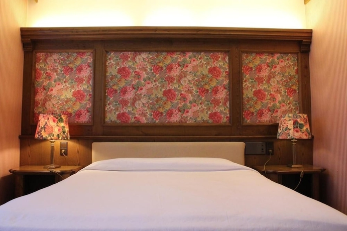 Imagen de la habitación del Hotel La Lepre Bianca. Foto 9