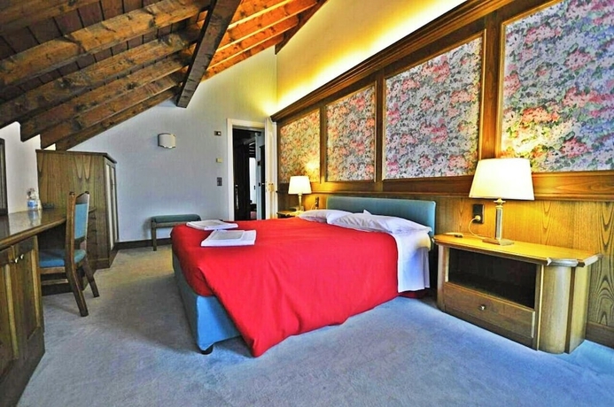 Imagen de la habitación del Hotel La Lepre Bianca. Foto 10