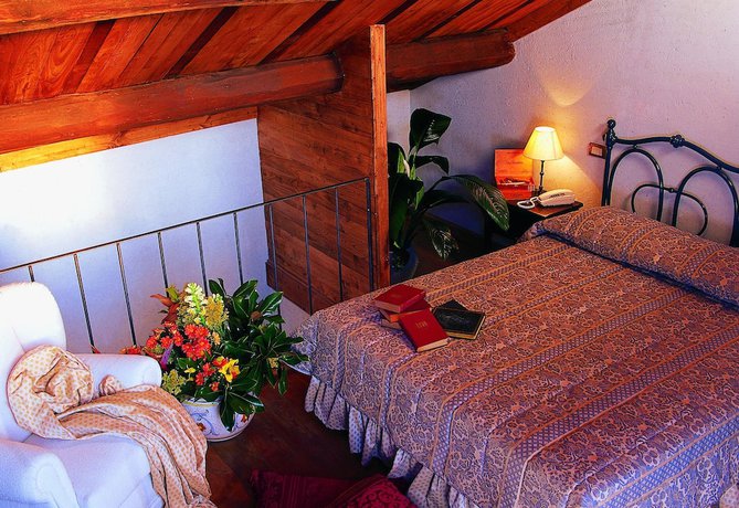 Imagen de la habitación del Hotel La Locanda Dei Ciocca. Foto 7