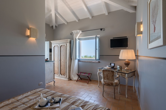 Imagen de la habitación del Hotel La Locanda Del Carrubo. Foto 10