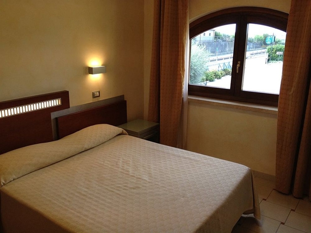 Imagen de la habitación del Hotel La Locanda Del Cavaliere. Foto 7