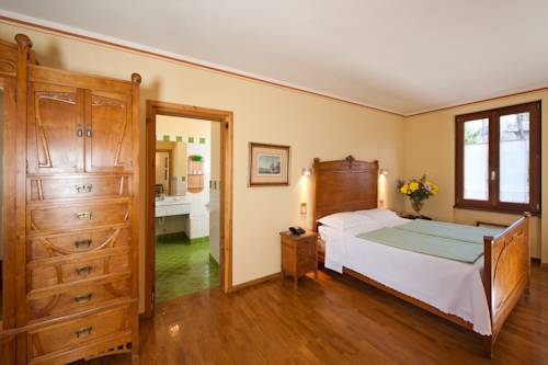 Imagen de la habitación del Hotel La Locanda Del Notaio. Foto 2