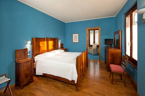 Imagen de la habitación del Hotel La Locanda Del Notaio. Foto 7