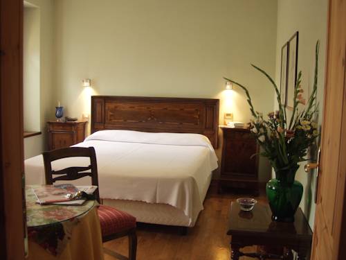 Imagen de la habitación del Hotel La Locanda Del Notaio. Foto 9