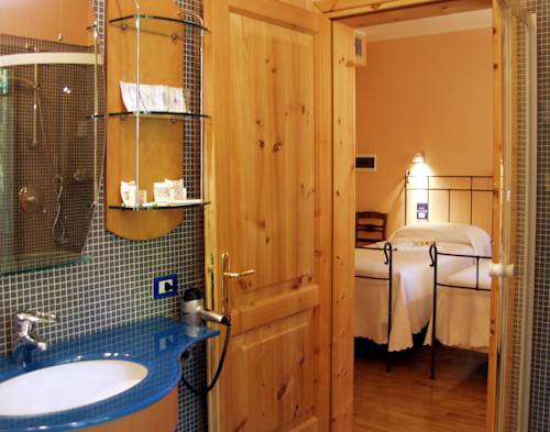 Imagen de la habitación del Hotel La Locanda Del Notaio. Foto 10