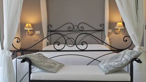 Imagen de la habitación del Hotel La Locanda Della Castellana. Foto 5