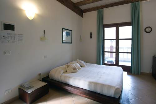 Imagen de la habitación del Hotel La Locanda Della Castellana. Foto 6