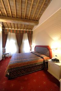 Imagen de la habitación del Hotel La Locanda, Volterra. Foto 2